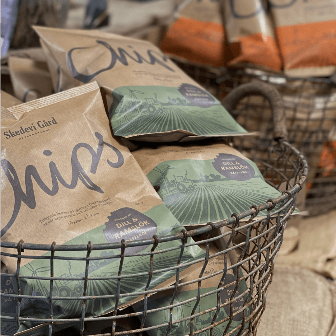 Chips i korg grön påse